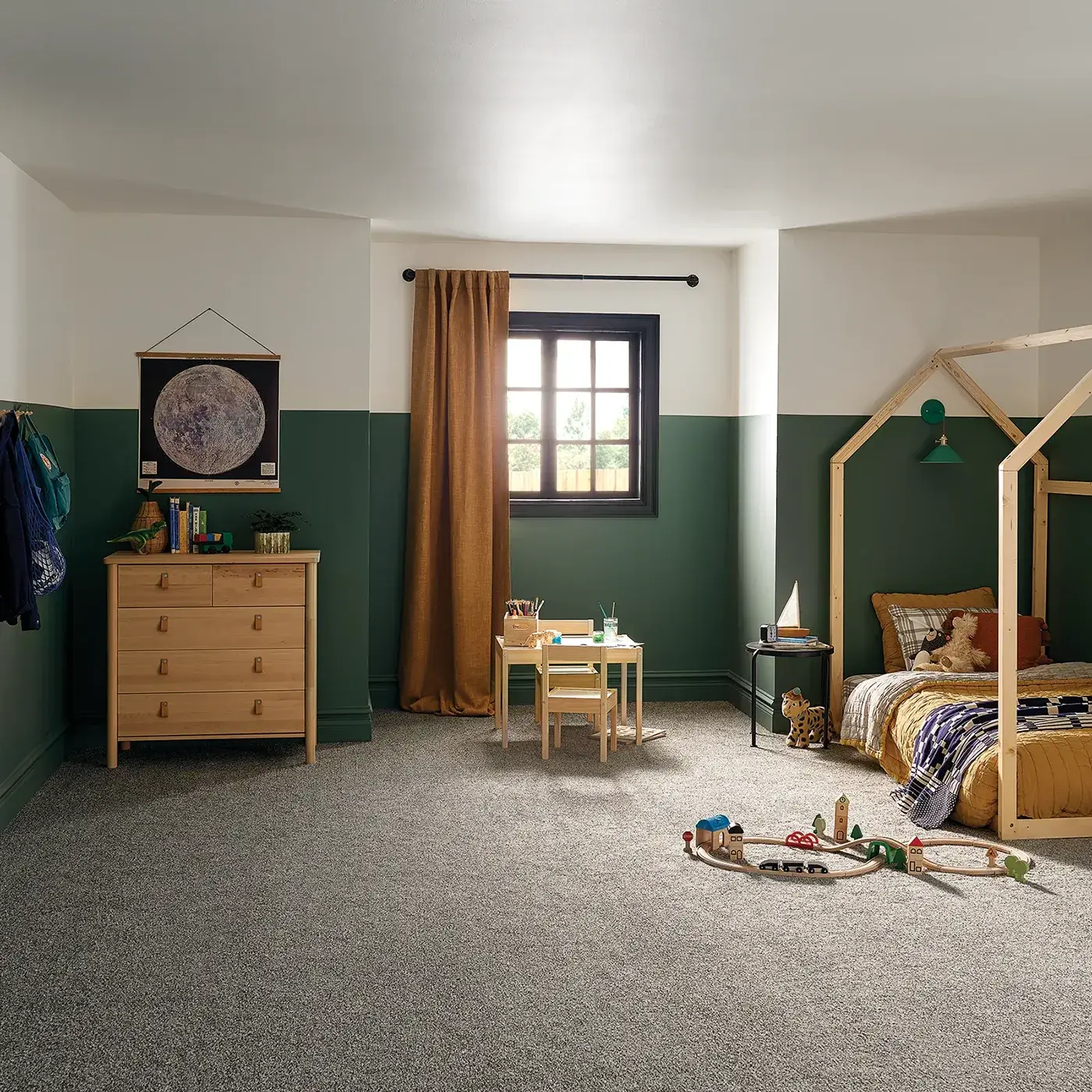 MJ007_TweedComfortBlue_00178_Bedroom_H Gray Shaw Floors carpet in a warm colored kids bedroom with forest green walls