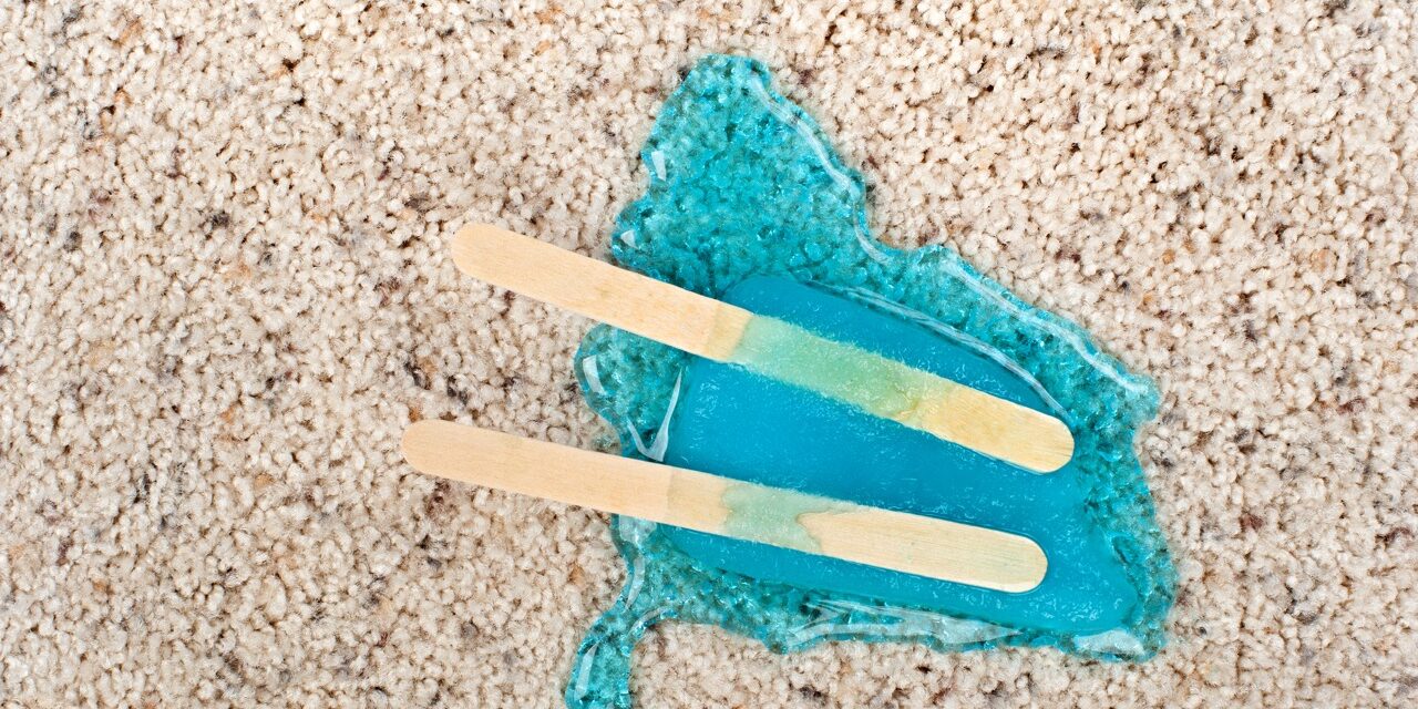 A melting popsicle on carpet with stain protection.